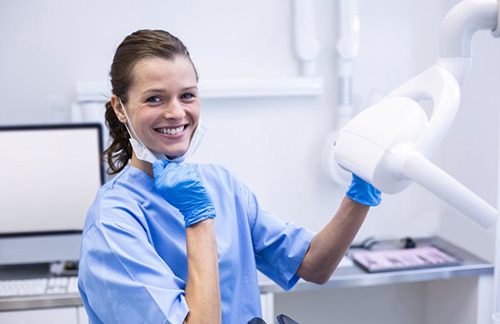 Dental hygienist smiles