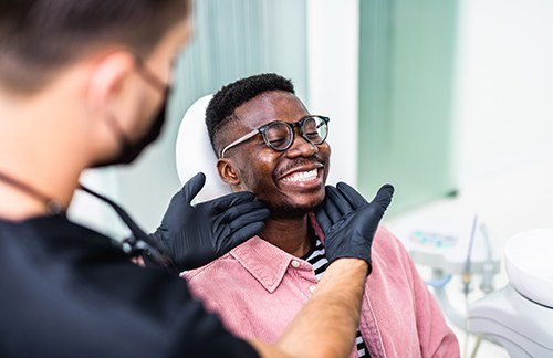 Man smiling in the dental chair