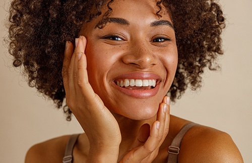 Closeup of woman with white teeth smiling
